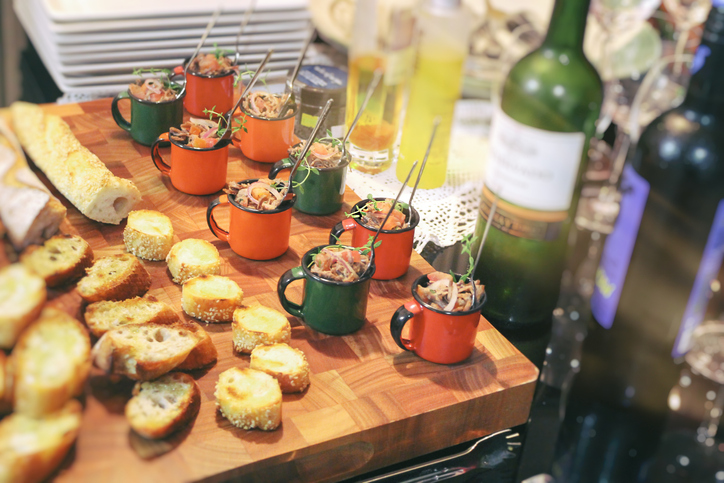 2020 South Walton Beaches Food & Wine Festival butchers block with hors d'oeuvres and open bottles of wine