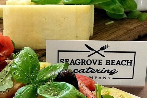 Amenities & Services cheese and produce with catering signage