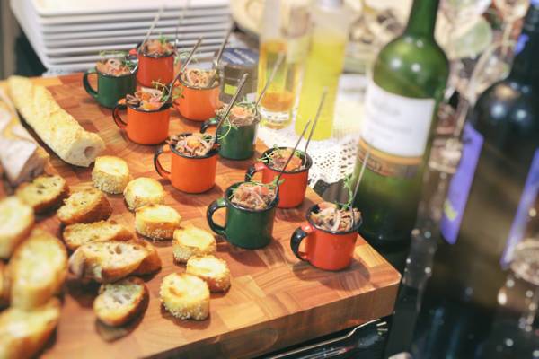 2020 South Walton Beaches Food & Wine Festival butchers block with hors d'oeuvres and open bottles of wine